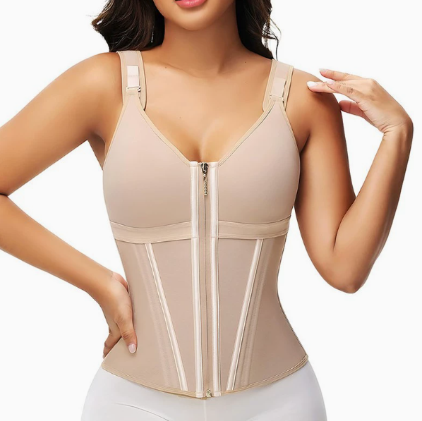 Woman wearing a beige waist trainer on a white background