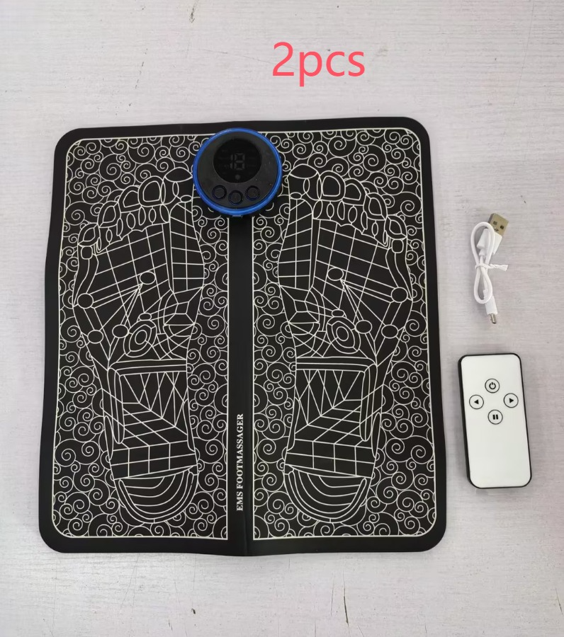 Black and white patterned mat with blue device, remote control, and USB cable