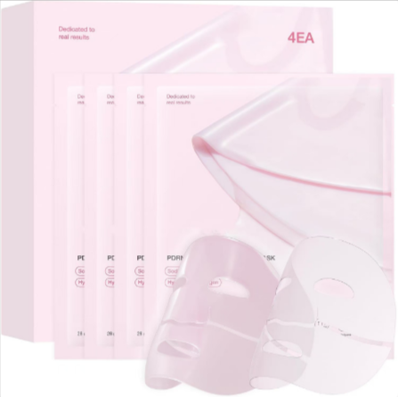 Set of pink face masks with packaging on a white background