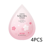 Pink drop-shaped container labeled 'Japan Sakura Toner' with cherry blossom designs on a white background.