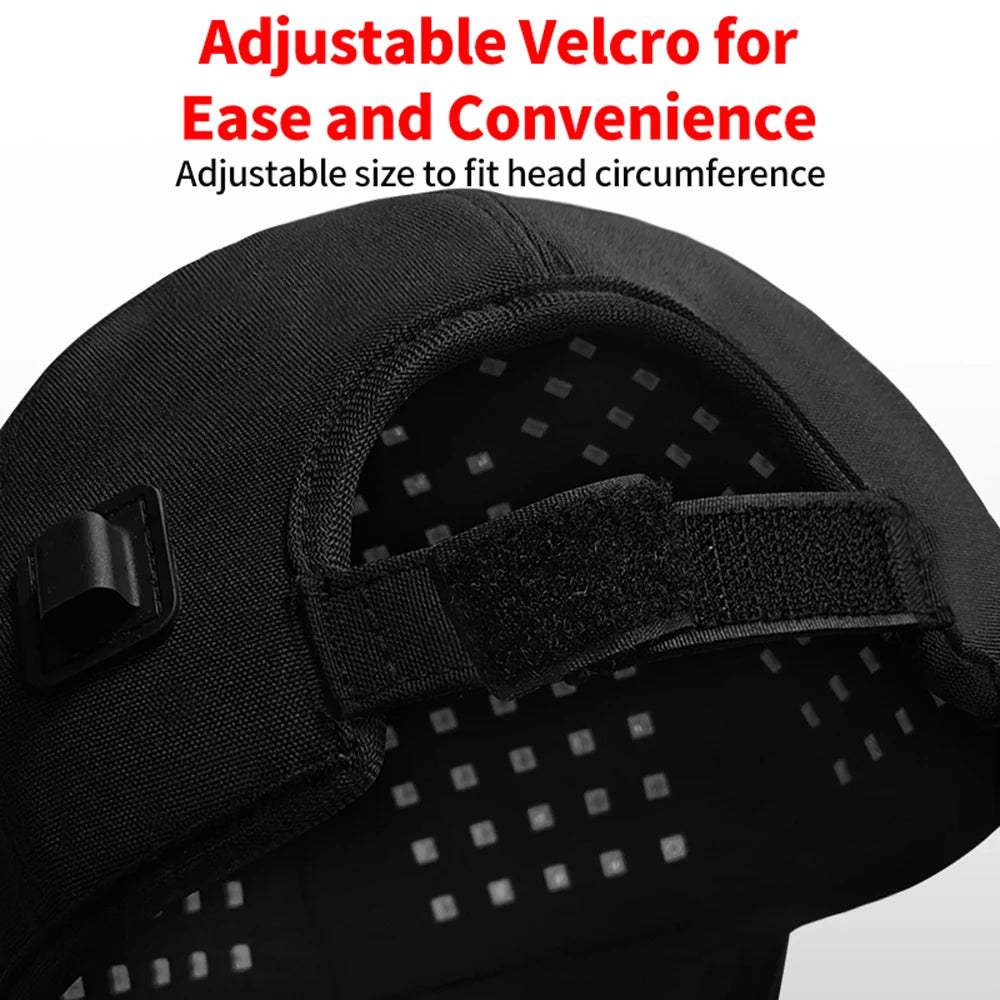 Black helmet with adjustable velcro strap on a white background