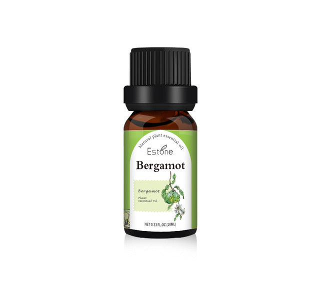 Essential oil bottle labeled 'Ginger' by 'Estone' on a white background