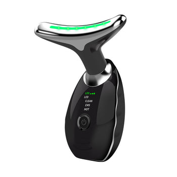 Black electronic device with a green light on a white background