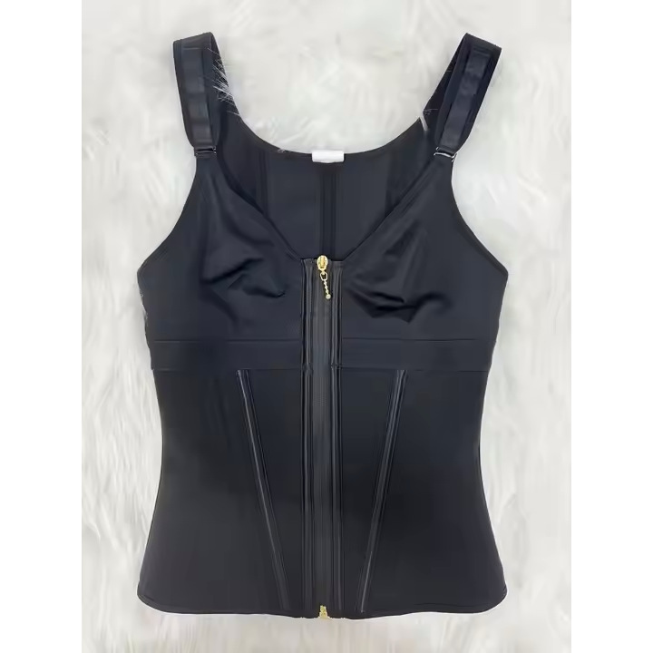 Black zip-up top with thin straps on a white background