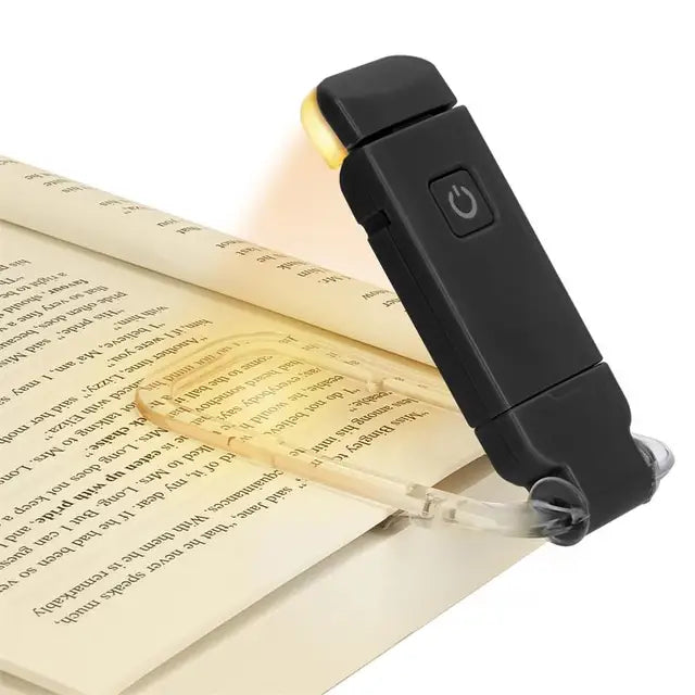 Reading lamp with clip on a book