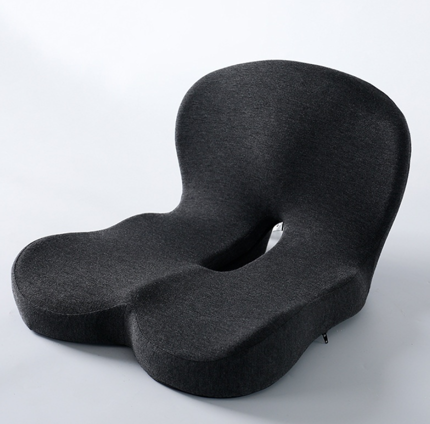 Black ergonomic seat cushion on a white background