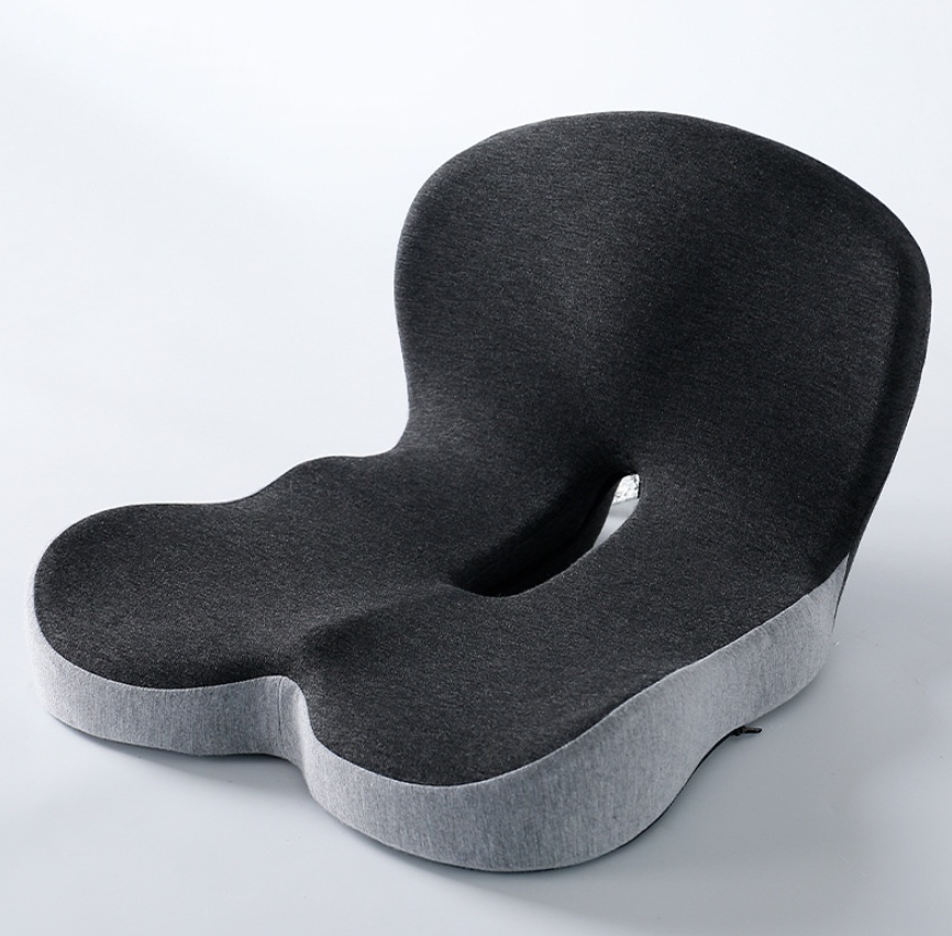 Gray ergonomic seat cushion on a white background