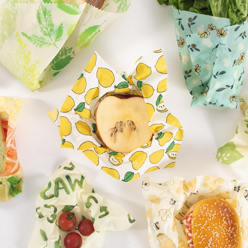 Reusable food wraps with various patterns on a white background