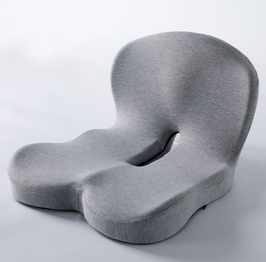 Gray cushion with unique design on a white background
