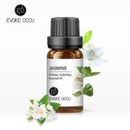 Essential oil bottle with jasmine flowers on a white background, featuring the brand 'Evoke Occu'.