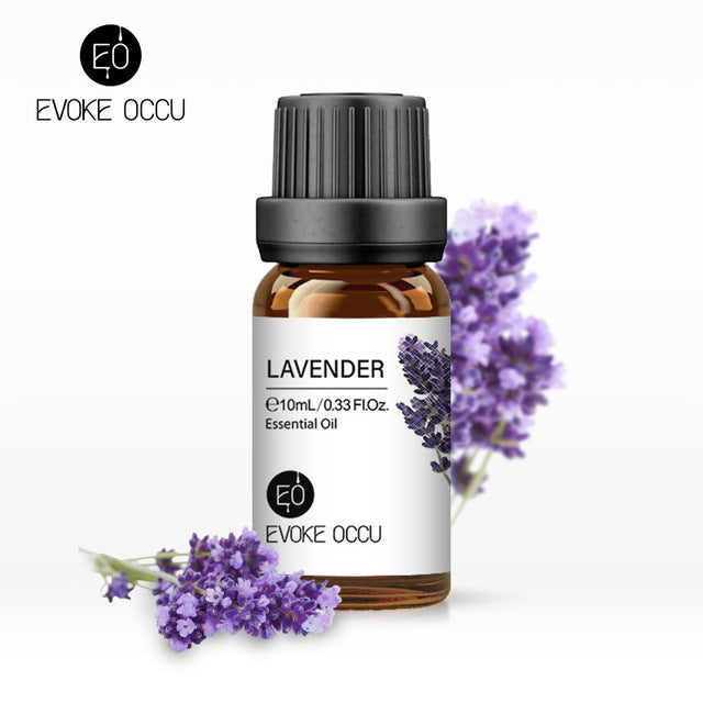 Evoke Occu lavender essential oil bottle with lavender flowers on a white background