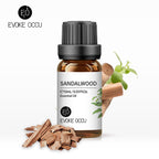 Sandalwood essential oil bottle with sandalwood pieces and leaves on a white background, featuring Evoke Occu branding.