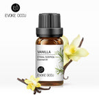 Vanilla essential oil bottle with flowers on a white background, featuring Evoke Occu branding.